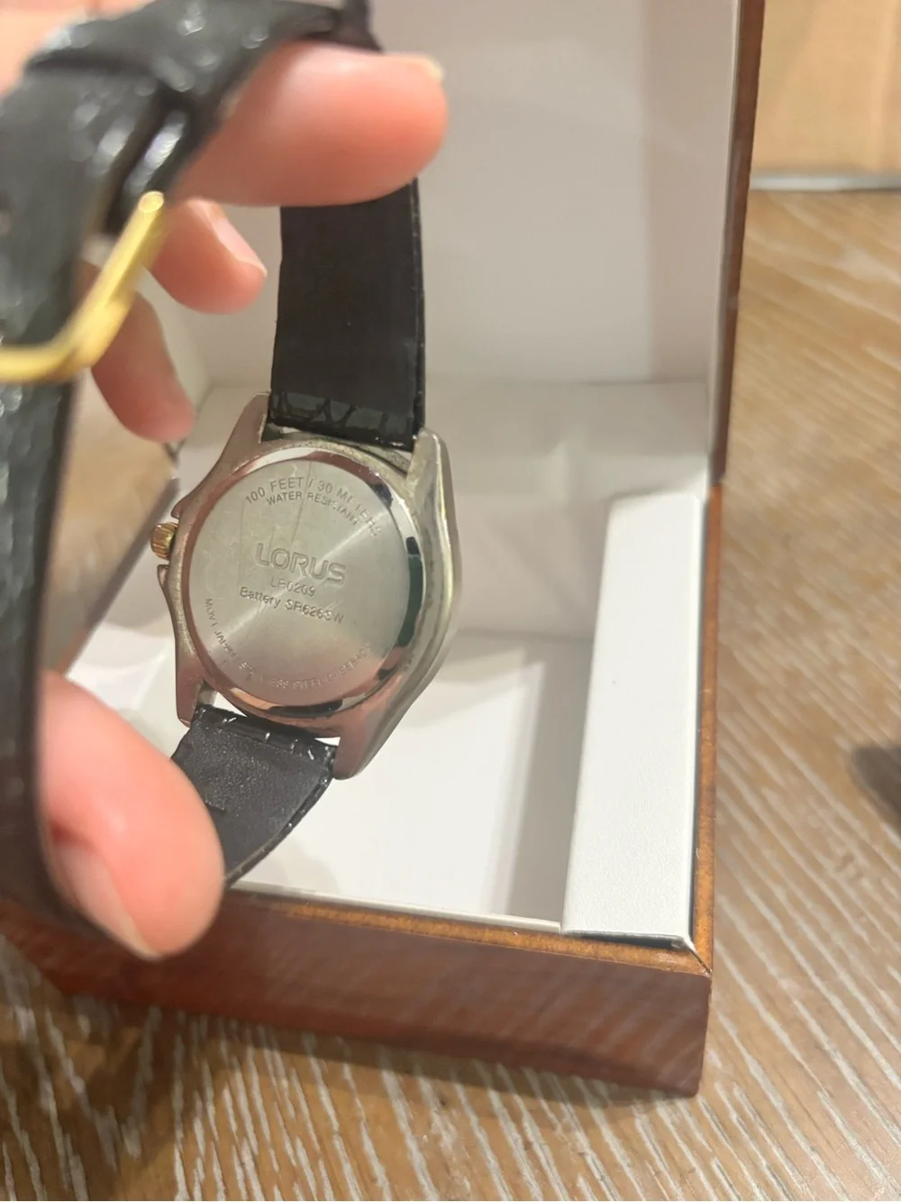 Lorus Black Dial Men's Watch with Gold-Tone Bezel and Black Leather Strap